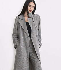 A woman in a plaid trench coat and pants stands against a plain white background. carousel Product Image 2