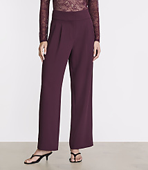 A person in burgundy wide-leg pants and a lace top stands against a plain white background. carousel Product Image 2