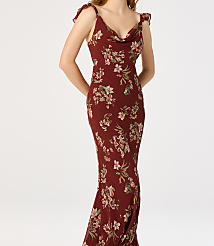 A woman in a floral print dress stands against a plain white background. carousel Product Image 4