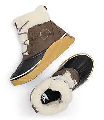 A pair of brown and black Sorel boots with white fur trim are laid out on a white background. carousel Product Image 5