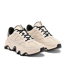 A pair of cream-colored Sorel sneakers with black laces and leopard print accents are displayed against a plain white background. carousel Product Image 2