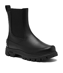 A black leather Chelsea boot with a thick lug sole stands against a plain white background. carousel Product Image 1