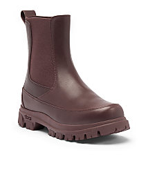 A burgundy Chelsea boot with a thick lug sole stands against a plain white background. carousel Product Image 1