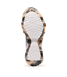 A white sneaker sole with a marbled brown and tan trim is presented against a plain white background. carousel Product Image 4