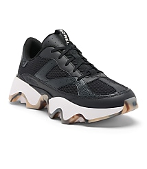 A black Sorel sneaker with a chunky white sole rests on a white background. carousel Product Image 1