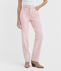 A person wearing light pink denim jeans and tan ankle boots stands against a plain white background. carousel Product Image 2