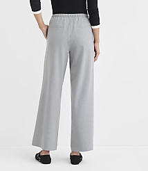 A person stands in light gray wide-leg pants and black flats against a plain white background. carousel Product Image 3
