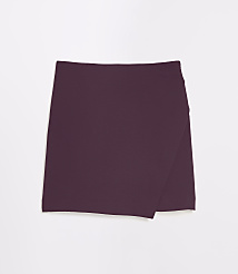 A plum-colored wrap skirt lies flat against a white background. carousel Product Image 5