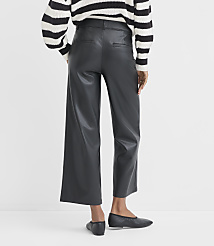 A person wearing black faux leather culottes and a striped sweater stands against a plain white background. carousel Product Image 3