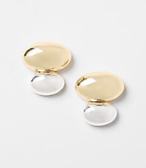 Two gold and silver oval earrings are displayed against a plain white background. carousel Product Image 1