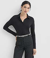 A woman in a black collared shirt and pinstripe pants stands against a plain white background. carousel Product Image 1