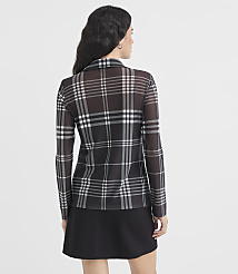 A woman in a sheer plaid top and black skirt stands against a plain white background. carousel Product Image 3