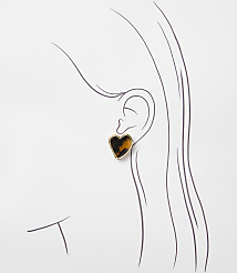 A tortoiseshell heart-shaped earring is worn on a sketched ear against a white background. carousel Product Image 2
