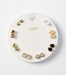 A white circular card displays a collection of assorted earrings, with a plain white background. carousel Product Image 1