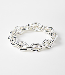 A chunky silver chain bracelet lies on a plain white background. carousel Product Image 1