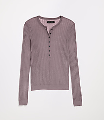 A mauve, ribbed henley shirt with dark buttons is laid flat against a plain white background. carousel Product Image 3