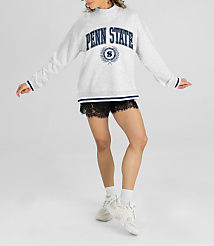 A woman in a Penn State sweatshirt and lace shorts stands against a plain white background. carousel Product Image 1