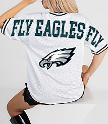 A person in a white "FLY EAGLES FLY" jersey with an eagle logo sits against a plain white background. carousel Product Image 2