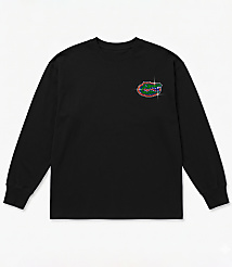 A black long-sleeved t-shirt with a glittery alligator logo on the left chest is laid flat against a white background. carousel Product Image 2