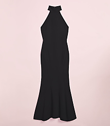 A black halter-neck mermaid gown is displayed against a soft pink background. carousel Product Image 2