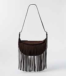A dark brown suede fringe bag with a single strap hangs against a plain white background. carousel Product Image 1