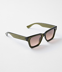 A pair of olive green sunglasses with gradient brown lenses rests on a plain white background. carousel Product Image 1