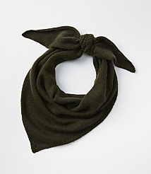 A dark green knitted scarf is tied in a bow in the foreground against a plain white background. carousel Product Image 2