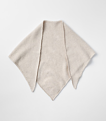 A light-colored, fuzzy triangular scarf lies flat against a plain white background. carousel Product Image 1