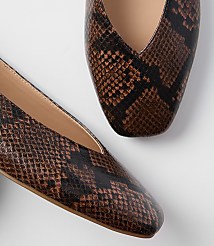 A pair of brown snakeskin pointed-toe flats rests on a plain white background. carousel Product Image 2