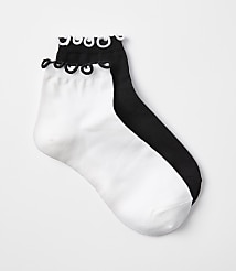 A pair of white and black ankle socks with ruffled cuffs are laid out on a plain white background. carousel Product Image 1