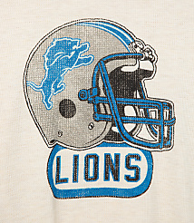 A Detroit Lions helmet logo with the word "LIONS" below it is centered on a cream-colored textured background. carousel Product Image 3