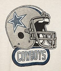 A Dallas Cowboys helmet with the team name below is centered on a textured, light-colored background. carousel Product Image 3