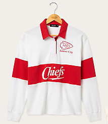 A white and red striped long-sleeved rugby shirt with "Chiefs" and "Kansas City" printed on it hangs on a wooden hanger against a plain white background. carousel Product Image 1
