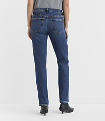 A person wearing blue jeans and black boots stands against a plain white background. carousel Product Image 3
