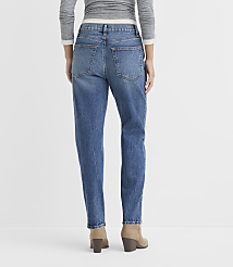 A person wearing blue jeans and tan boots stands against a plain white background. carousel Product Image 4