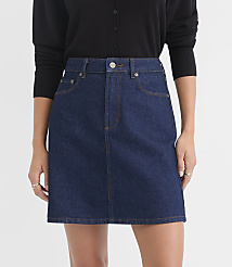 A dark wash denim skirt with a black cardigan is presented against a plain white background. carousel Product Image 2