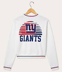 A white sweatshirt with a New York Giants logo on the back is hanging on a wooden hanger against a plain white background. carousel Product Image 2