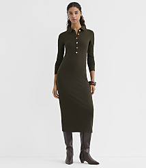 A woman in a long-sleeved, olive green ribbed midi dress and brown boots stands against a plain white background. carousel Product Image 1