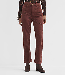 A person stands in rust-colored corduroy pants and a floral-patterned top against a plain white background. carousel Product Image 1