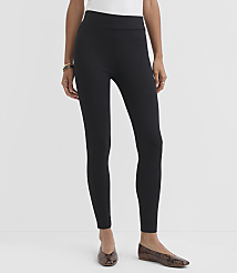 A person wearing black leggings and patterned flats stands against a plain white background. carousel Product Image 2