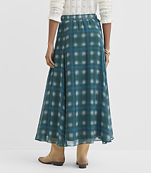 A person wearing a teal plaid maxi skirt and tan boots stands against a plain white background. carousel Product Image 3