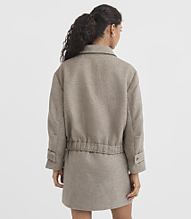 A woman in a brown jacket and skirt stands against a plain white background. carousel Product Image 4