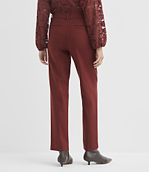 A person wearing a maroon lace top and maroon high-waisted trousers stands against a plain white background. carousel Product Image 2