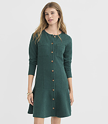 A woman in a green textured dress stands against a plain white background. carousel Product Image 1