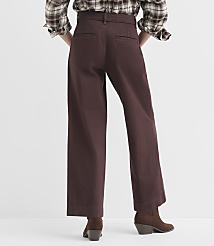 A person wearing brown wide-leg pants and boots stands against a plain white background. carousel Product Image 2