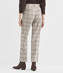 A person wearing plaid pants and brown boots stands against a plain background. carousel Product Image 3
