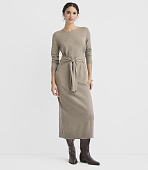 A woman in a taupe knit dress and brown boots stands against a plain white background. carousel Product Image 2