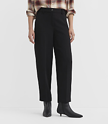 A person stands in black trousers and boots against a plain white background. carousel Product Image 2
