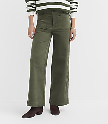 A person wearing olive green corduroy pants and a striped sweater stands against a plain white background. carousel Product Image 2