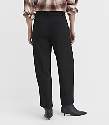 A person wearing black pants and a plaid shirt stands against a plain white background. carousel Product Image 3